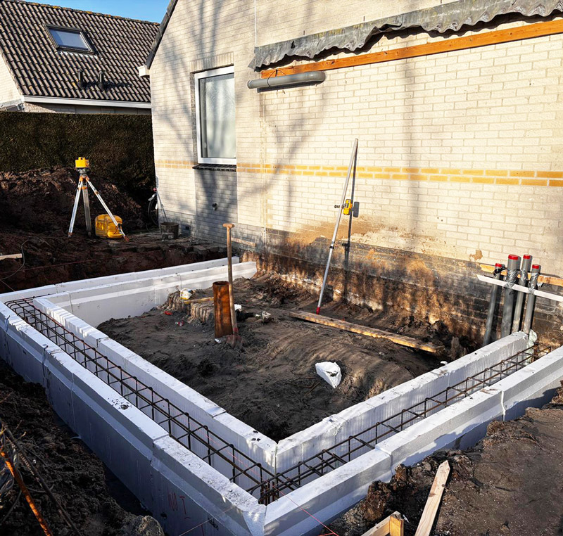 Beton vloer storten aanbouw