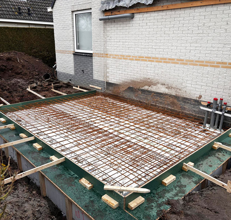 Beton vloer storten aanbouw