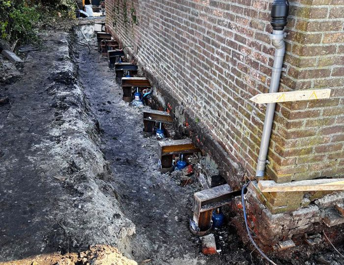 Verzakking huis oplossen